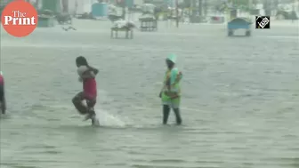 Marina Beach flooded due to downpour in Chennai, at least 12 people dead