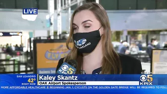 BUSY TRAVEL DAY:  Lines swelled at Oakland International Airport early Wednesday with holiday travel