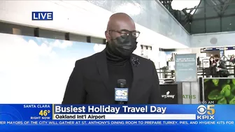 BUSY TRAVEL DAY:  Lines swelled at Oakland International Airport early Wednesday with holiday travel