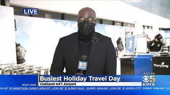 BUSY TRAVEL DAY:  Lines swelled at Oakland International Airport early Wednesday with holiday travel