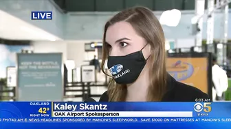 BUSY TRAVEL DAY:  Lines swelled at Oakland International Airport early Wednesday with holiday travel