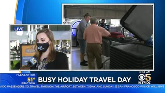 BUSY TRAVEL DAY:  Lines swelled at Oakland International Airport early Wednesday with holiday travel