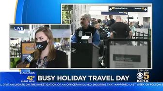 BUSY TRAVEL DAY:  Lines swelled at Oakland International Airport early Wednesday with holiday travel