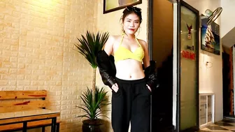 Bikini try on haul - Yellow bikini with short jeans, black trousers and leather jacket