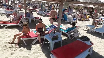 2021 Light Beach, Relaxation, Sea, Sun, 4K video, Bikini Beach, Romania Mamaia Beach.