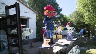 Friends create holiday parade float with trash found on the beach