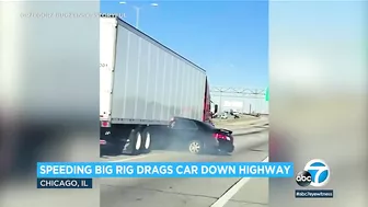 Video: Big rig drags car down highway with driver pinned underneath trailer l ABC7