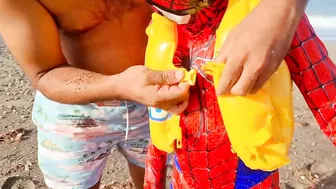 spider-man superhero at the beach