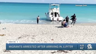 Migrants come ashore on beach in Jupiter