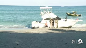 Migrants come ashore on beach in Jupiter