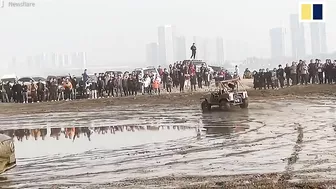 2 injured after out-of-control off-road vehicle crashes into beach bystanders in China