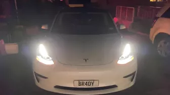 Tesla Model 3 Xmas Light Show projects it’s own name onto wall