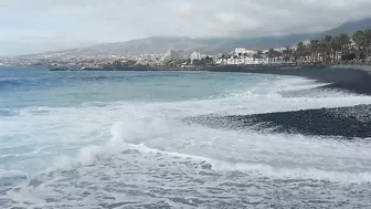 Red flag. The Ocean is storming. Las Americas Beach Walk. Tenerife Waves. Travel blog from Spain 4K