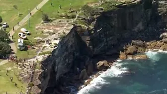 Man dies after falling from cliff at beach in Sydney's east