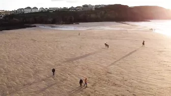 Horse Riding on the Beach at Sunset