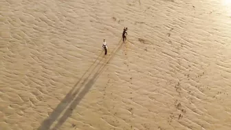 Horse Riding on the Beach at Sunset