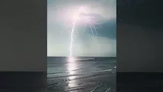 Lightning Bolts Strike in Sky Above Australian Beach During Storm - 1265701