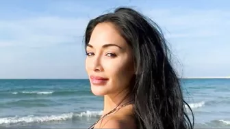 Nicole Scherzinger showcases her flawless figure in tiny string bikini