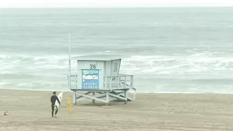 Surfers hit California beach despite US West Coast tsunami alert | AFP