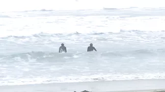 Surfers hit California beach despite US West Coast tsunami alert | AFP