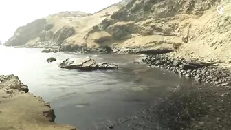 Tonga Volcano Eruption Causes Oil Spill on Lima Beach in Peru