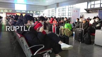 China: Beijing train stations filled with passengers amid Spring Festival travel rush