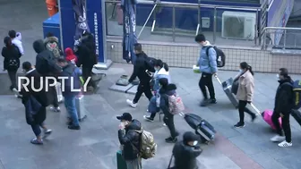 China: Beijing train stations filled with passengers amid Spring Festival travel rush