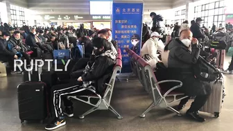 China: Beijing train stations filled with passengers amid Spring Festival travel rush