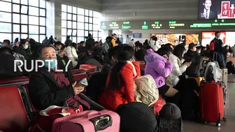 China: Beijing train stations filled with passengers amid Spring Festival travel rush