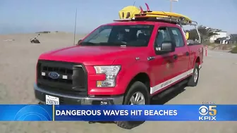 Powerful Surf Strikes Coast; Surfers At Ocean Beach Brave Dangerous Waves