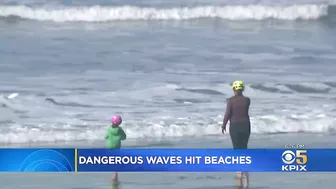 Powerful Surf Strikes Coast; Surfers At Ocean Beach Brave Dangerous Waves