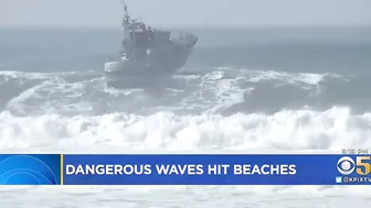 Powerful Surf Strikes Coast; Surfers At Ocean Beach Brave Dangerous Waves