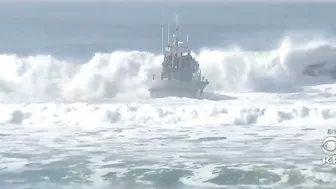 Powerful Surf Strikes Coast; Surfers At Ocean Beach Brave Dangerous Waves