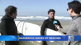 Powerful Surf Strikes Coast; Surfers At Ocean Beach Brave Dangerous Waves