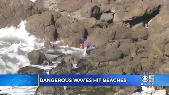 Powerful Surf Strikes Coast; Surfers At Ocean Beach Brave Dangerous Waves