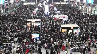 Crowds throng Shanghai train station during Chinese New Year travel rush | AFP