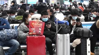 Crowds throng Shanghai train station during Chinese New Year travel rush | AFP