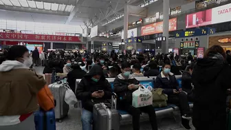 Crowds throng Shanghai train station during Chinese New Year travel rush | AFP