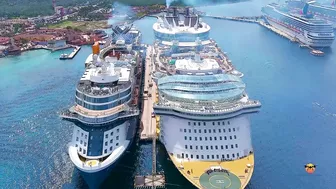 Oasis of the Sea and Celebrity Apex cruise ships docked next to each other - Aerial drone view