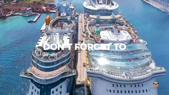 Oasis of the Sea and Celebrity Apex cruise ships docked next to each other - Aerial drone view