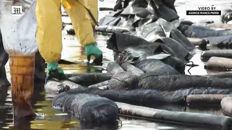 Workers scramble to clean oil slick from Thai beach