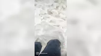 Dutch beach gone from storm, crazy foam adventure