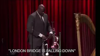 Shaq using normal sized things and being a giant