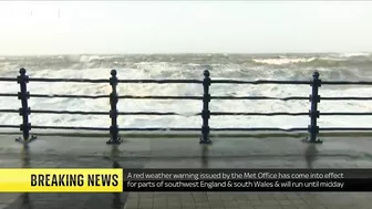 Storm Eunice: Sky correspondent gets hit by wave