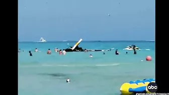 Helicopter crashes into water off crowded Miami beach