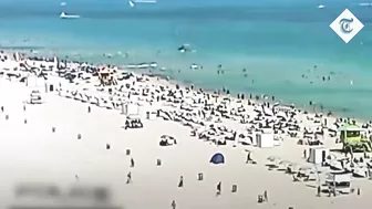 Moment helicopter crashes feet away from swimmers at Miami’s South Beach