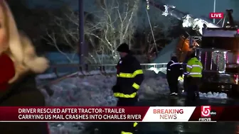 Crash into Charles: Driver rescued after tractor-trailer carrying US mail ends up in river