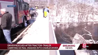 Crash into Charles: Driver rescued after tractor-trailer carrying US mail ends up in river