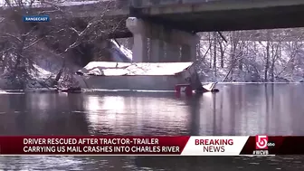 Crash into Charles: Driver rescued after tractor-trailer carrying US mail ends up in river