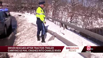 Crash into Charles: Driver rescued after tractor-trailer carrying US mail ends up in river